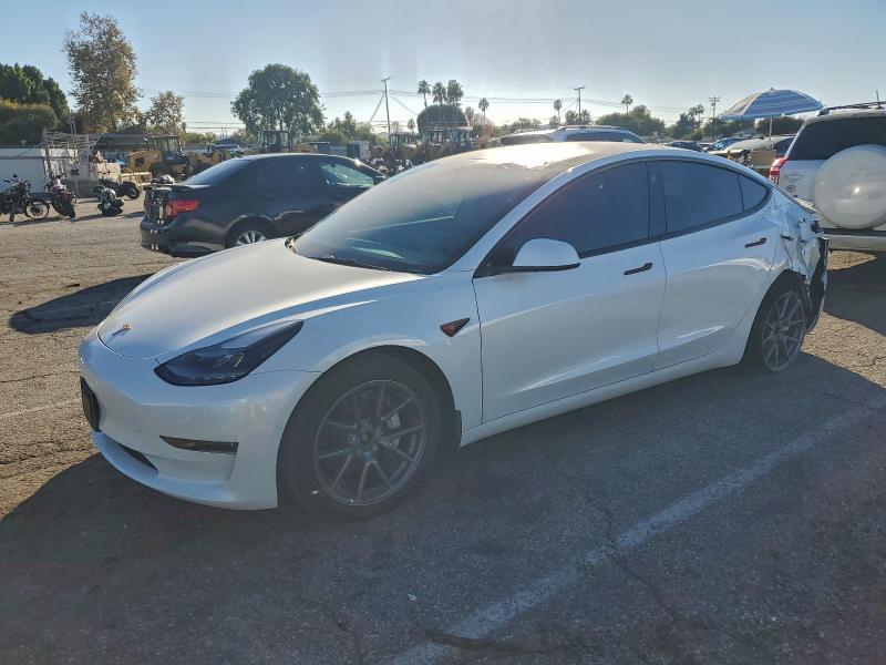 TESLA MODEL 3 2022 with VIN 5YJ3E1EB3NF212267 - Photo from auction