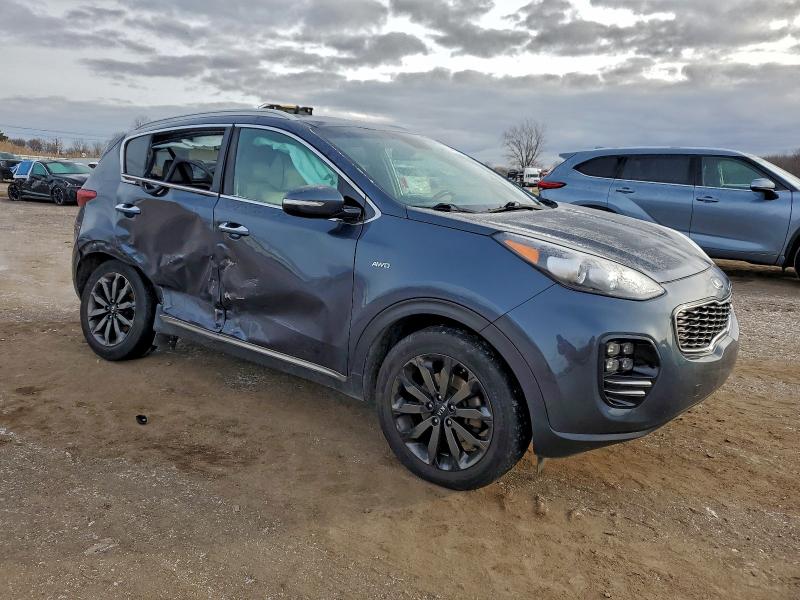 Photo 4 from auction – 2018 KIA SPORTAGE E with VIN KNDPNCAC0J7451626
