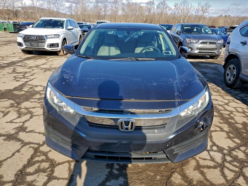 Photo 5 from auction – 2018 HONDA CIVIC LX with VIN 2HGFC2F54JH610210