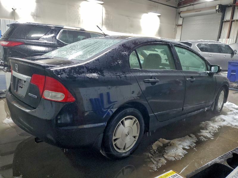 Photo 3 from auction – 2011 HONDA CIVIC HYBR with VIN JHMFA3F28BS001436