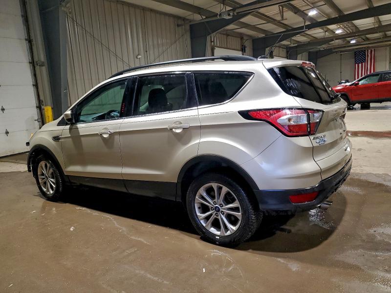 Photo 2 from auction – 2017 FORD ESCAPE with VIN 1FMCU9GD6HUC85642
