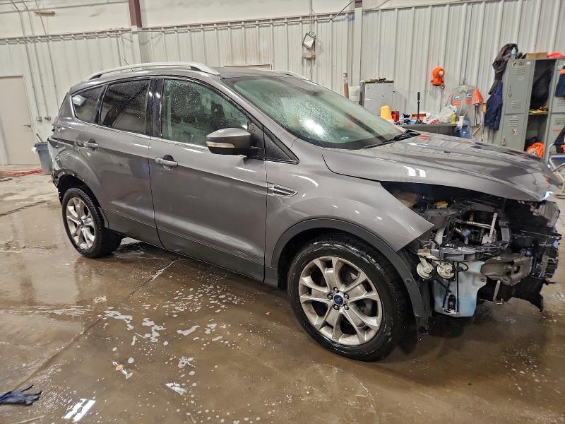 Photo 4 from auction – 2014 FORD ESCAPE TIT with VIN 1FMCU0JX2EUB45968