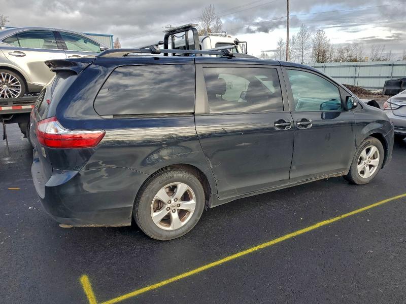 Photo 3 from auction – 2015 TOYOTA SIENNA LE with VIN 5TDKK3DC1FS683910