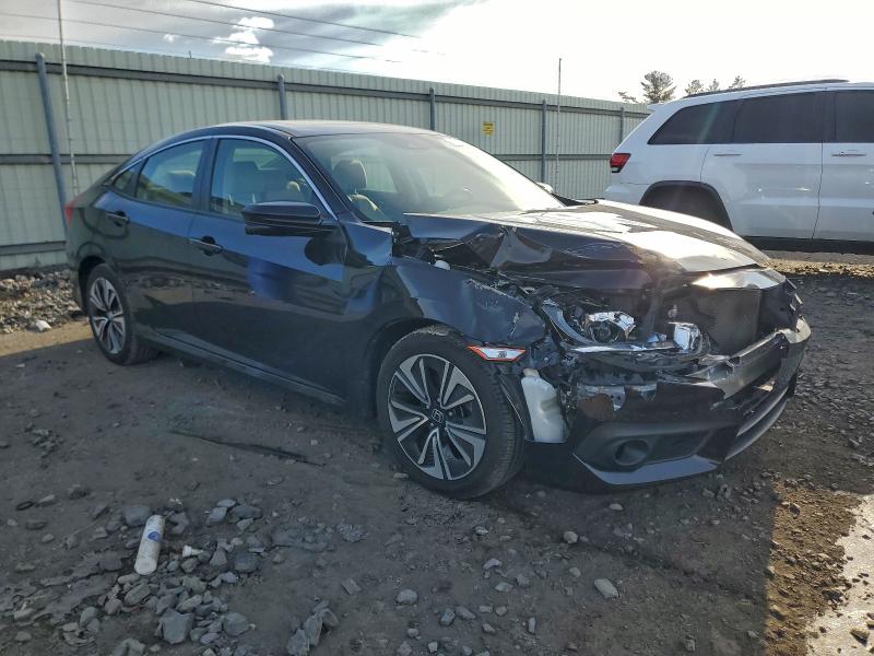 Photo 4 from auction – 2018 HONDA CIVIC EX with VIN JHMFC1F44JX011916