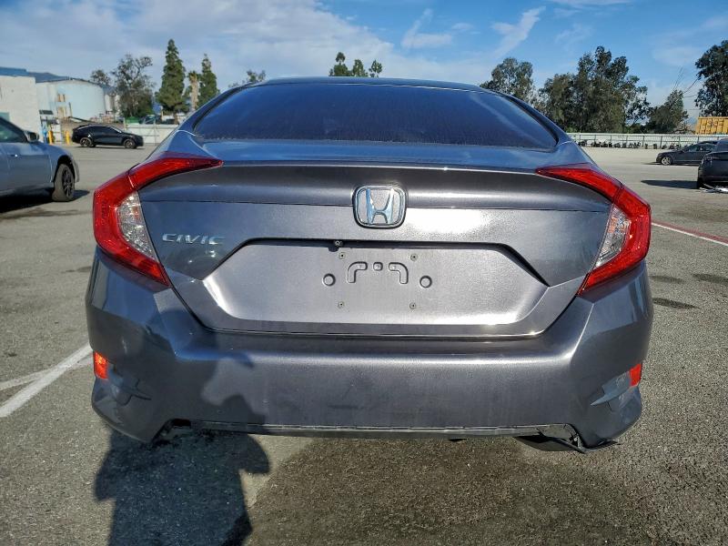 Photo 6 from auction – 2019 HONDA CIVIC with VIN 19XFC2F61KE203059