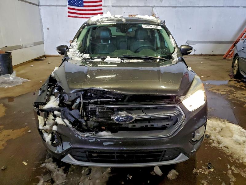 Photo 5 from auction – 2017 FORD ESCAPE with VIN 1FMCU9J94HUD60343
