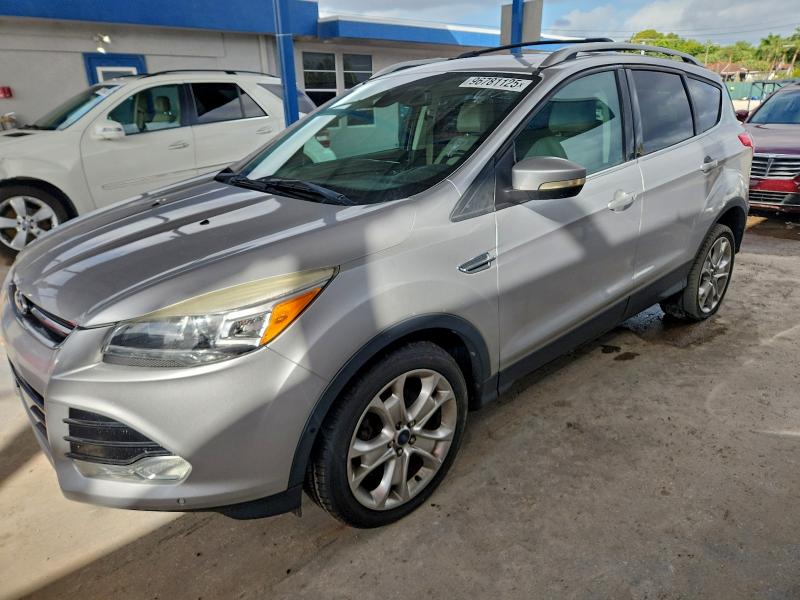 FORD ESCAPE TIT 2014 with VIN 1FMCU0JX4EUC17642 - Photo from auction