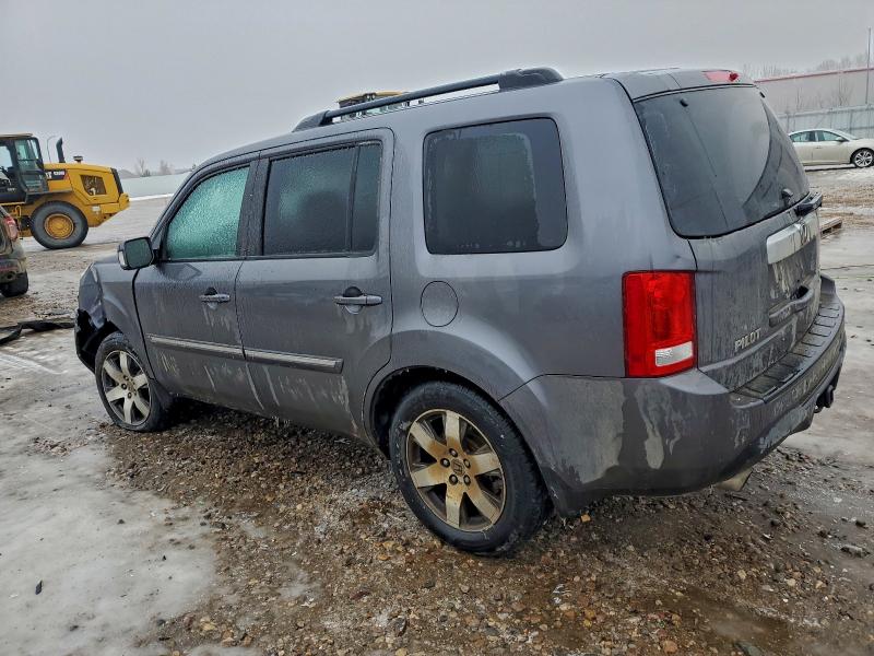 Photo 2 from auction – 2014 HONDA PILOT TOUR with VIN 5FNYF4H99EB042395