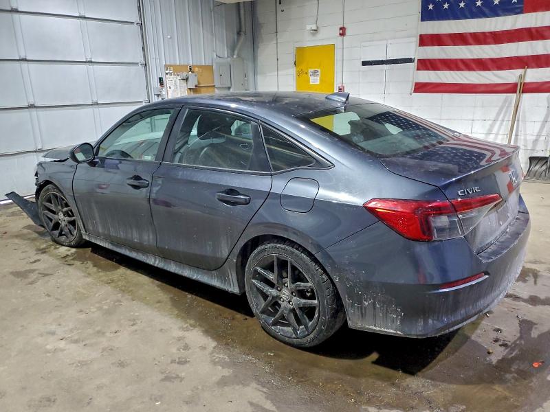 Photo 2 from auction – 2022 HONDA CIVIC SPOR with VIN 2HGFE2F58NH606970