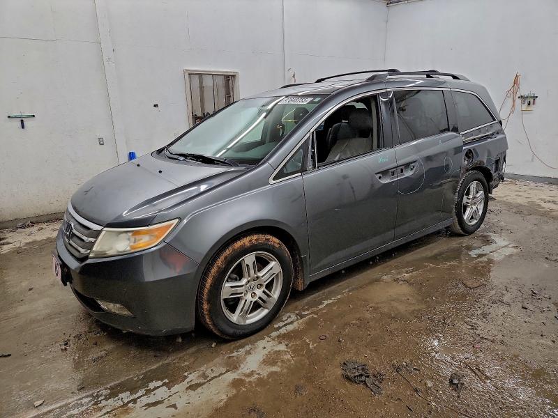 HONDA ODYSSEY TO 2012 with VIN 5FNRL5H96CB130580 - Photo from auction
