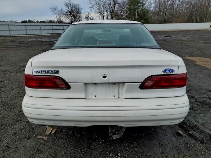 Photo 6 from auction – 1995 FORD TAURUS GL with VIN 1FALP52U9SG261133