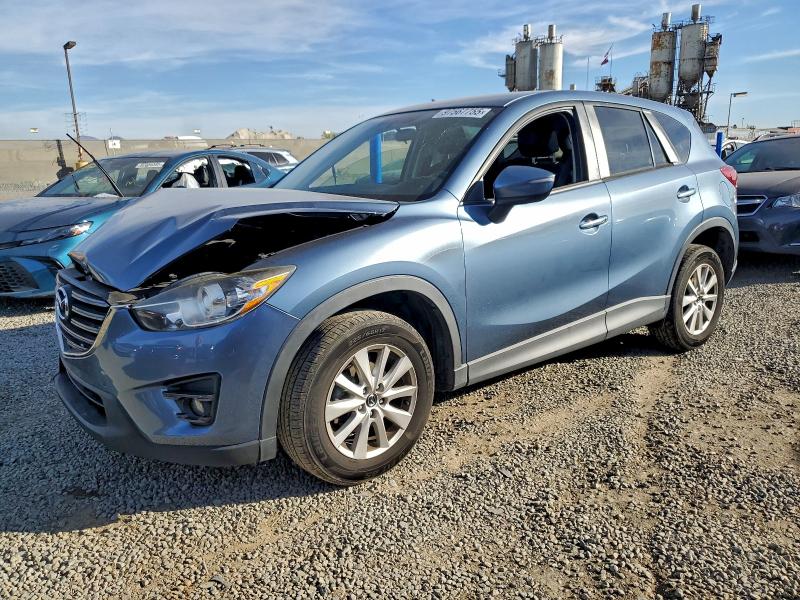 MAZDA CX-5 TOURI 2016 with VIN JM3KE2CY5G0674962 - Photo from auction
