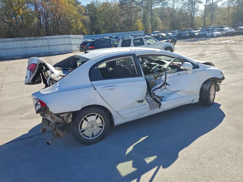 Photo 3 from auction – 2009 HONDA CIVIC HYBR with VIN JHMFA36219S001353