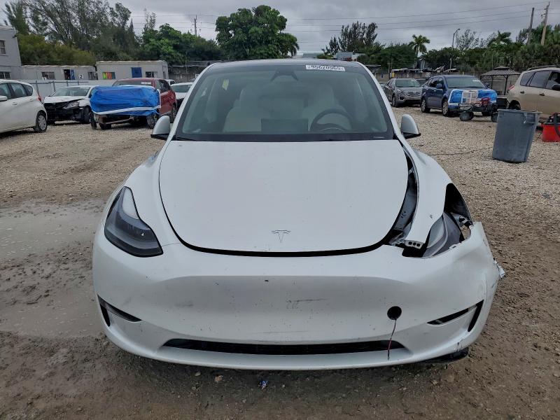 Photo 5 from auction – 2023 TESLA MODEL Y with VIN 7SAYGAEE4PF898450