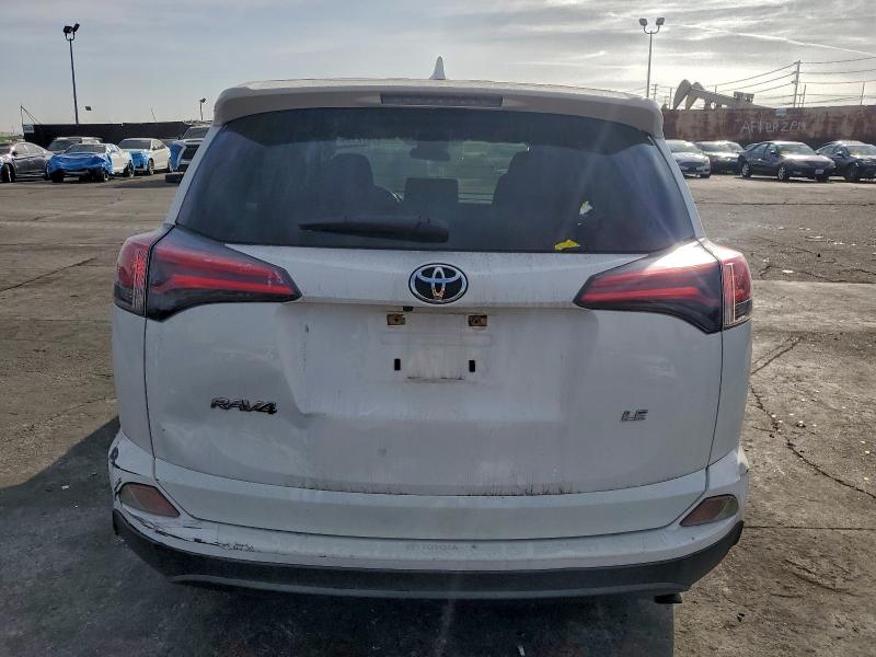 Photo 6 from auction – 2018 TOYOTA RAV4 LE with VIN JTMZFREVXJJ171011