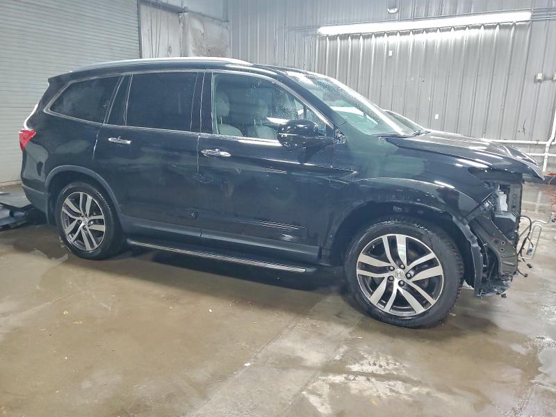 Photo 4 from auction – 2016 HONDA PILOT TOUR with VIN 5FNYF6H97GB123779