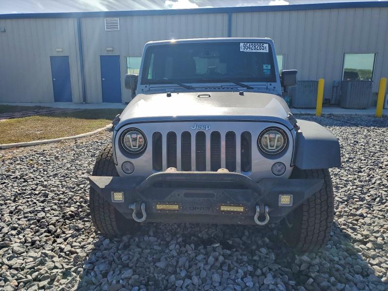 Photo 5 from auction – 2016 JEEP WRANGLER U with VIN 1C4BJWDG7GL208711