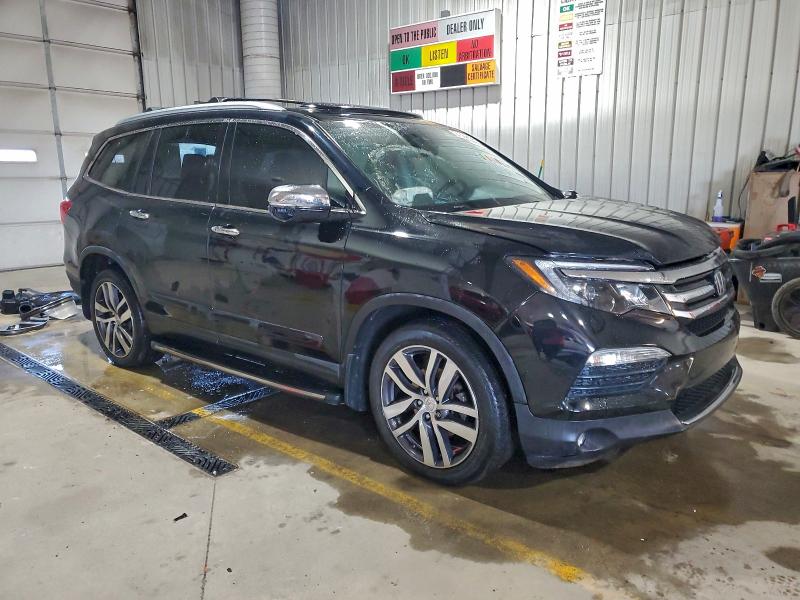 Photo 4 from auction – 2016 HONDA PILOT ELIT with VIN 5FNYF6H05GB032124
