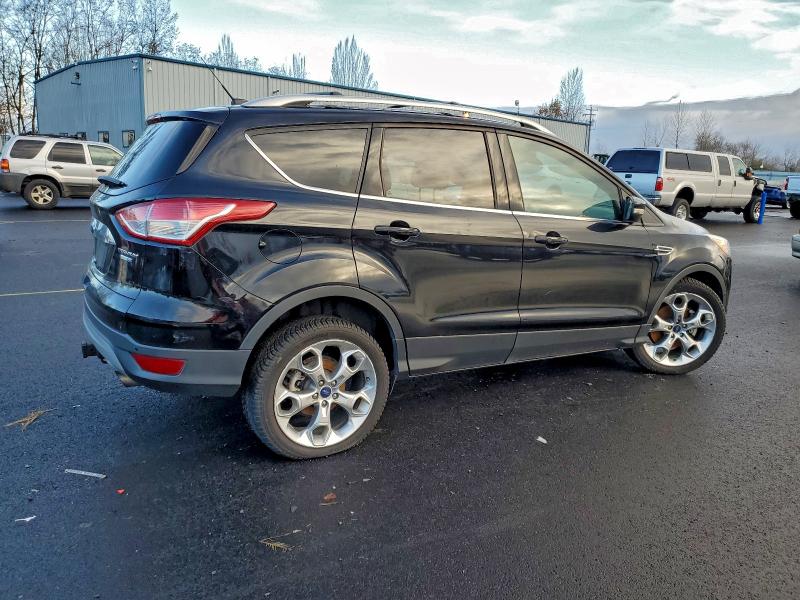 Photo 3 from auction – 2016 FORD ESCAPE TIT with VIN 1FMCU9J99GUC44702