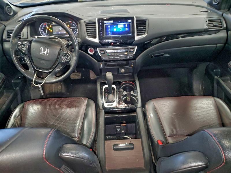 Photo 8 from auction – 2017 HONDA RIDGELINE with VIN 5FPYK3F86HB030622