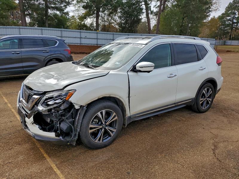 NISSAN ROGUE S 2017 with VIN 5N1AT2MT1HC878831 - Photo from auction