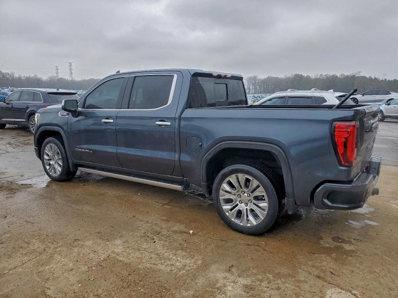 Photo 2 from auction – 2021 GMC SIERRA K15 with VIN 1GTU9FEL5MZ234620