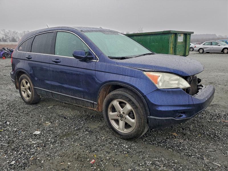 Photo 4 from auction – 2011 HONDA CR-V EXL with VIN 5J6RE4H71BL090630