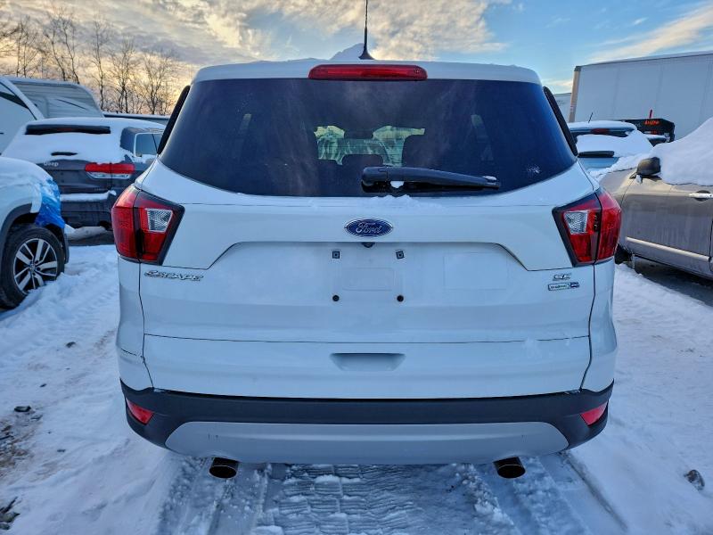 Photo 6 from auction – 2019 FORD ESCAPE SE with VIN 1FMCU9GD2KUA13371