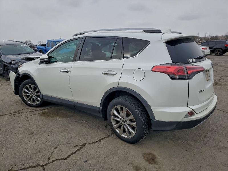 Photo 2 from auction – 2018 TOYOTA RAV4 LIMIT with VIN 2T3DFREV3JW788424
