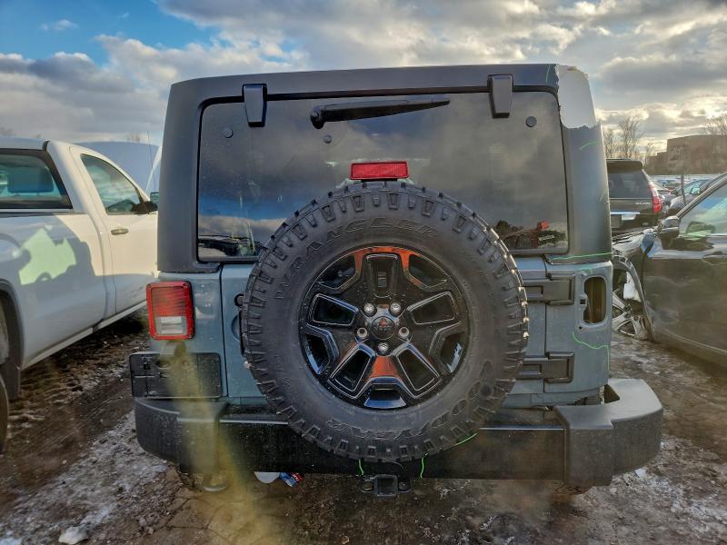 Photo 6 from auction – 2014 JEEP WRANGLER U with VIN 1C4BJWDG7EL306828
