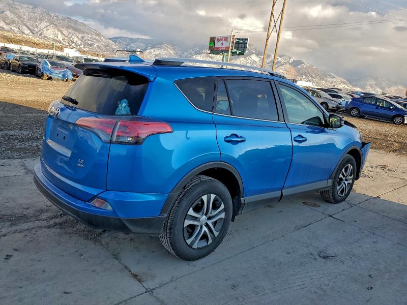 Photo 3 from auction – 2016 TOYOTA RAV4 LE with VIN JTMBFREV2GJ061208
