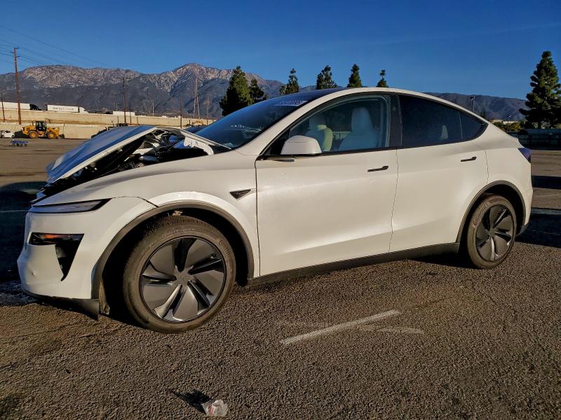 TESLA MODEL Y 2026 with VIN 7SAYGDED5TF520012 - Photo from auction