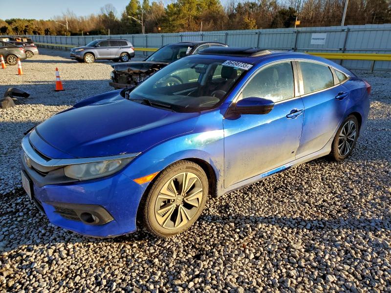 HONDA CIVIC EX 2016 with VIN 19XFC1F33GE028482 - Photo from auction