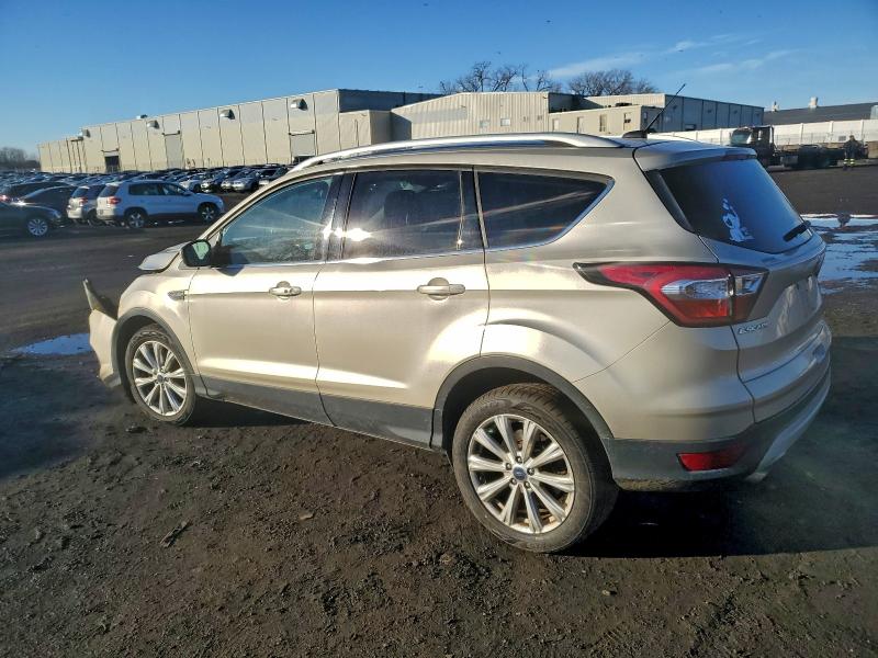 Photo 2 from auction – 2017 FORD ESCAPE TIT with VIN 1FMCU9JD8HUC57950