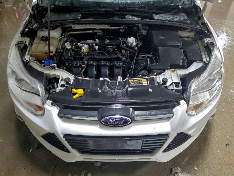 Photo 11 from auction – 2014 FORD FOCUS with VIN 1FADP3K25EL181461