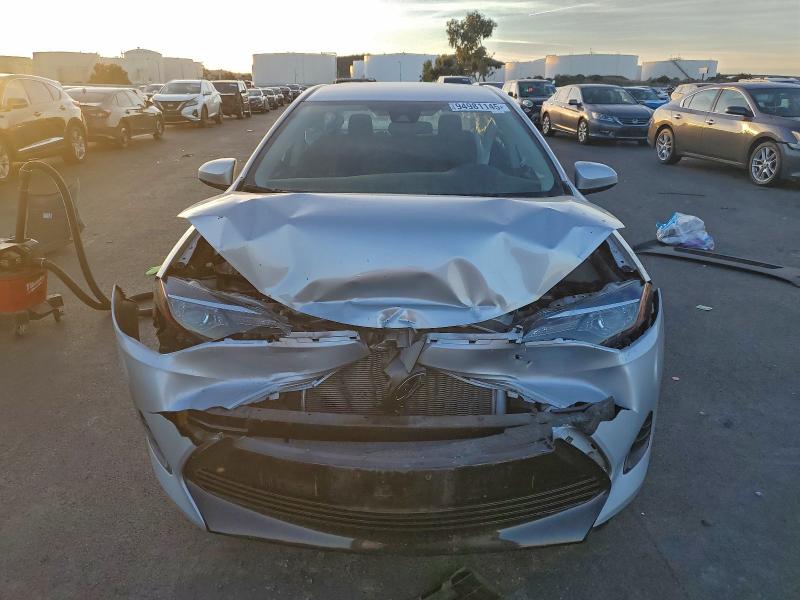 Photo 5 from auction – 2019 TOYOTA COROLLA L with VIN 5YFBURHE2KP879933
