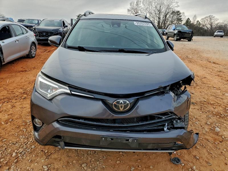 Photo 5 from auction – 2018 TOYOTA RAV4 LIMIT with VIN JTMDFREV7JD231979