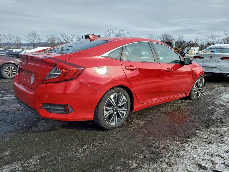Photo 3 from auction – 2017 HONDA CIVIC EX with VIN 2HGFC1F3XHH656952