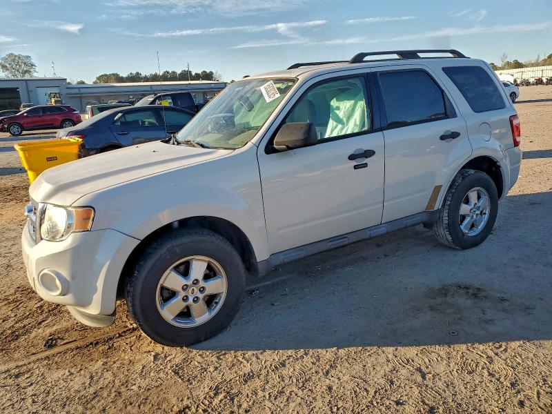 FORD ESCAPE 2011 with VIN 1FMCU0D70BKC48485 - Photo from auction