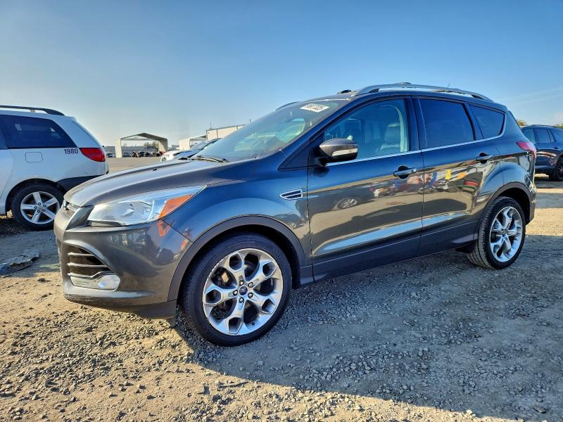 FORD ESCAPE TIT 2016 with VIN 1FMCU0JX5GUA73151 - Photo from auction