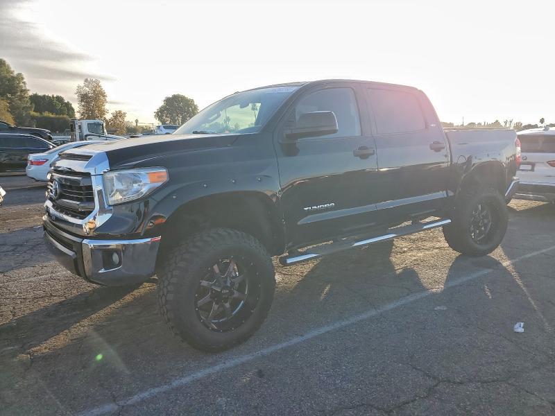 TOYOTA TUNDRA 2014 with VIN 5TFEM5F1XEX077660 - Photo from auction