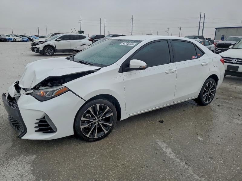 TOYOTA COROLLA L 2018 with VIN 5YFBURHE1JP773696 - Photo from auction