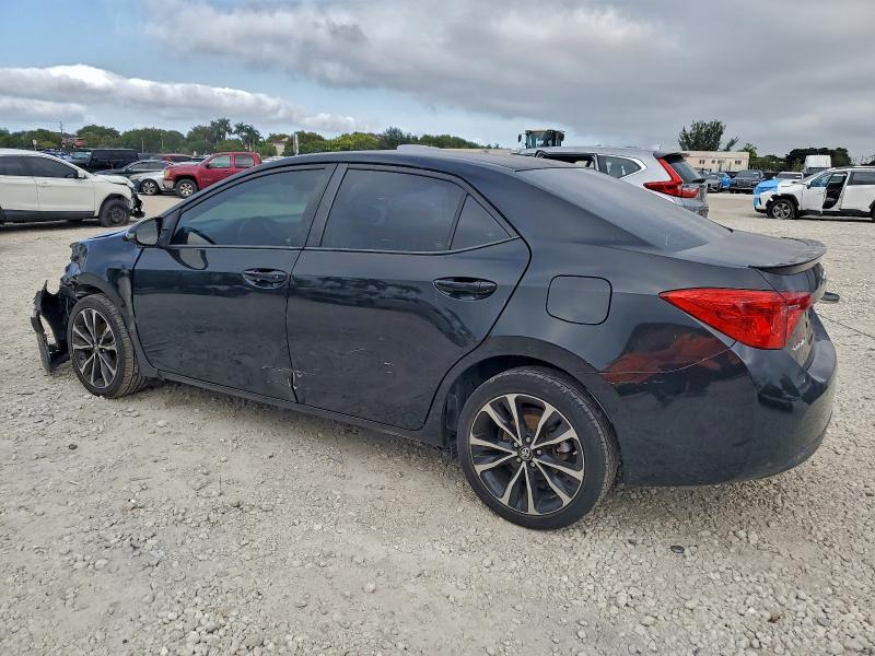 Photo 2 from auction – 2017 TOYOTA COROLLA L with VIN 5YFBURHEXHP714463