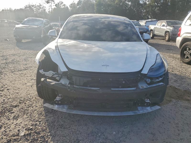 Photo 5 from auction – 2022 TESLA MODEL 3 with VIN 5YJ3E1EB8NF105098