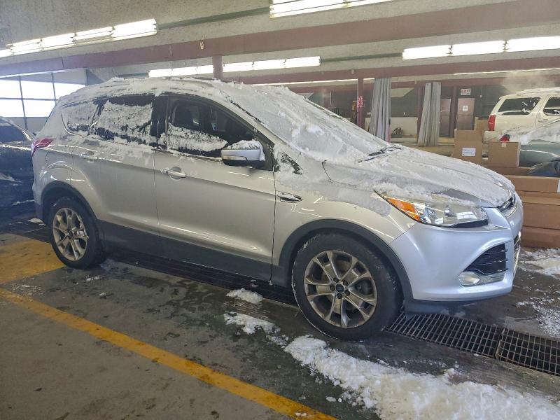 Photo 4 from auction – 2014 FORD ESCAPE TIT with VIN 1FMCU0J90EUB24716
