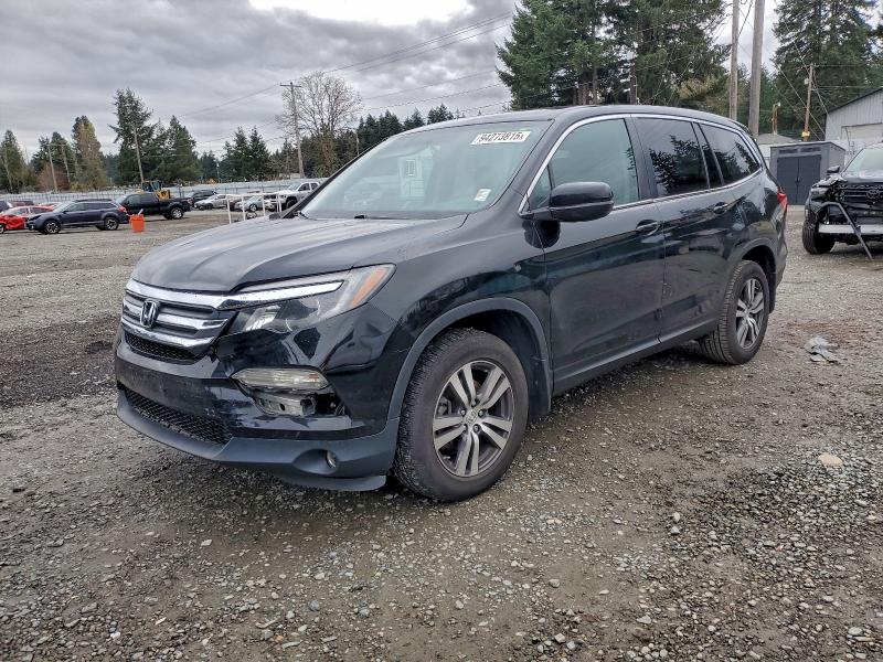 HONDA PILOT EXL 2016 with VIN 5FNYF6H55GB079858 - Photo from auction