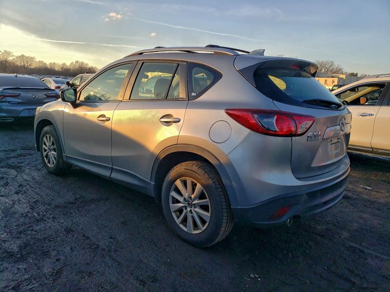 Photo 2 from auction – 2013 MAZDA CX-5 SPORT with VIN JM3KE2BE3D0119091