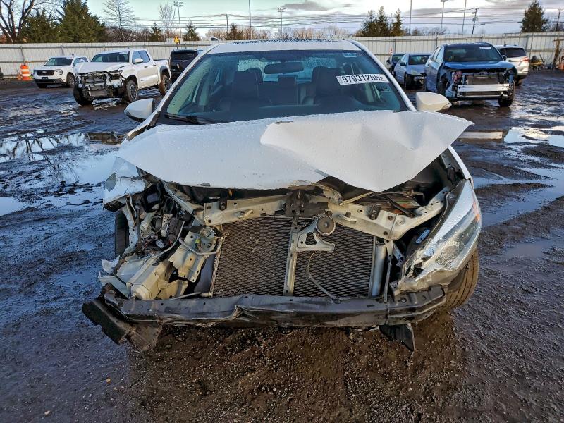 Photo 5 from auction – 2014 TOYOTA COROLLA L with VIN 5YFBURHE4EP000209