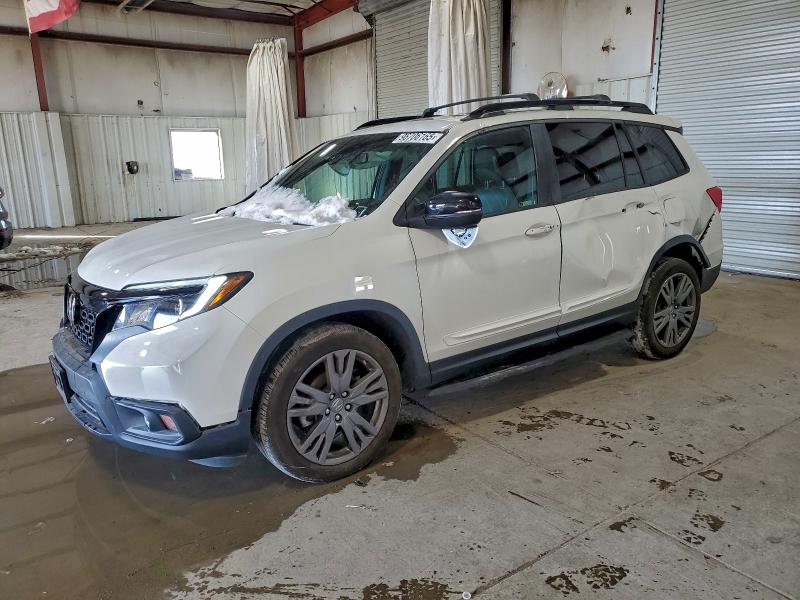 HONDA PASSPORT E 2021 with VIN 5FNYF8H5XMB014673 - Photo from auction