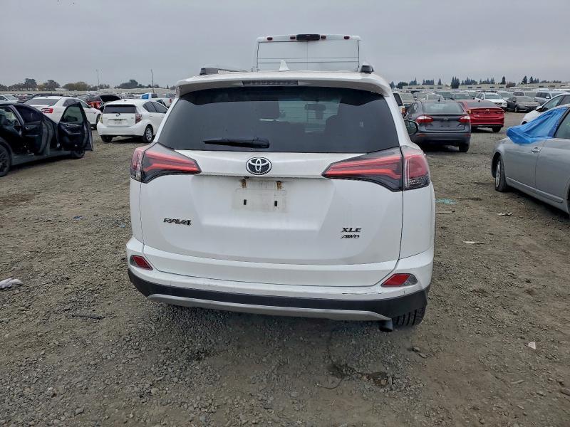 Photo 6 from auction – 2016 TOYOTA RAV4 XLE with VIN 2T3RFREV7GW431049